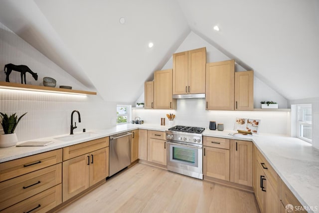 102 Baker St Unit A, San Francisco, CA 94117 - kitchen with appliances with stainless steel finishes, light brown cabinetry, open shelves, and vaulted ceiling