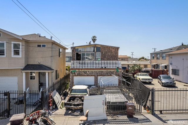 7115 Herbert Guice Way, Oakland, CA 94621 - view of front of property featuring fence private yard and stone siding