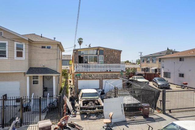 7115 Herbert Guice Way, Oakland, CA 94621 - view of front of house with stucco siding, a gate, and a fenced front yard