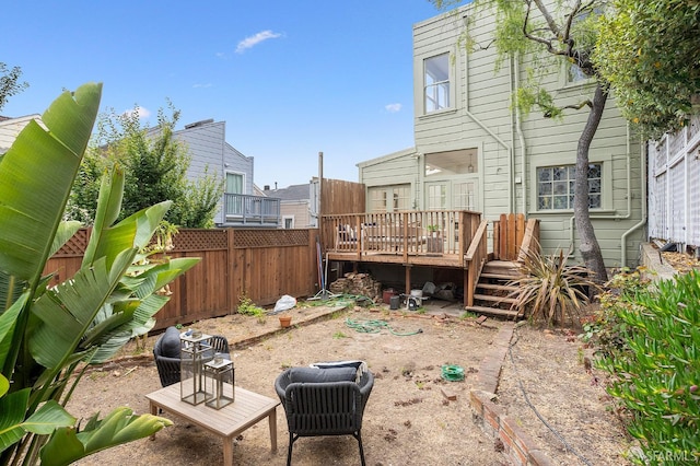 1908 Buchanan St, San Francisco, CA 94115 - rear view of property with a wooden deck and a fenced backyard