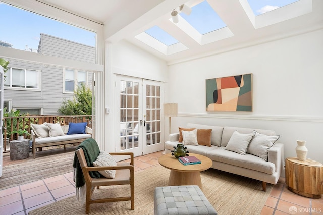 1908 Buchanan St, San Francisco, CA 94115 - living room with a skylight, tile patterned floors, french doors, and high vaulted ceiling