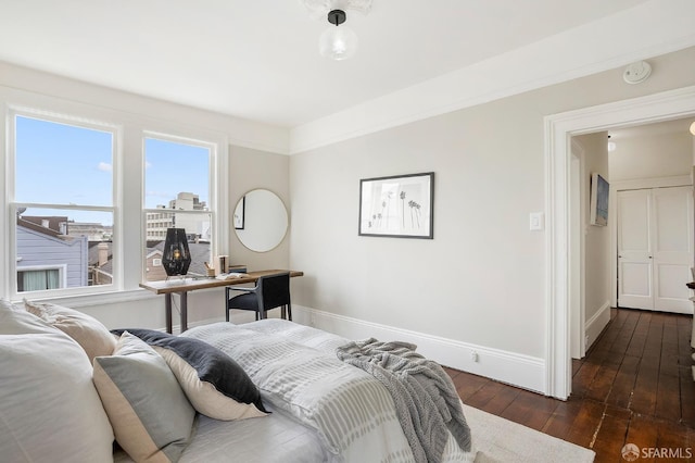 1908 Buchanan St, San Francisco, CA 94115 - bedroom with dark wood-type flooring and baseboards