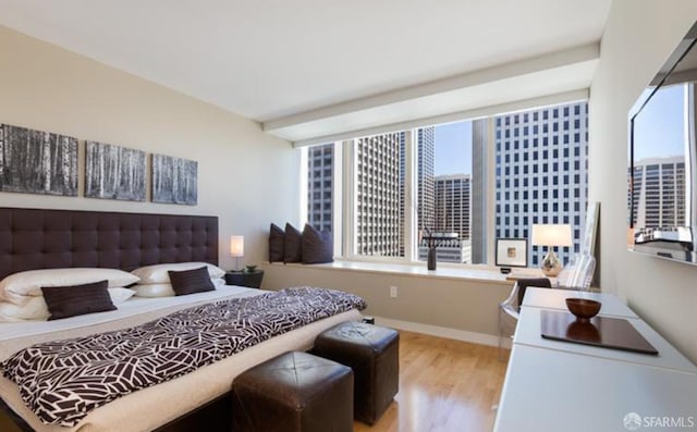 301 Mission St Unit 20E, San Francisco, CA 94105 - bedroom with wood finished floors and baseboards