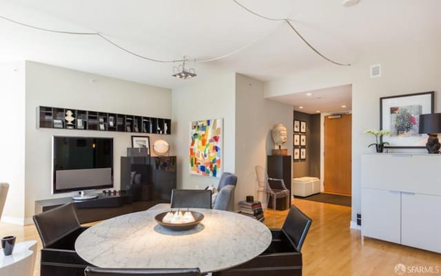 301 Mission St Unit 20E, San Francisco, CA 94105 - dining space with wood finished floors and recessed lighting