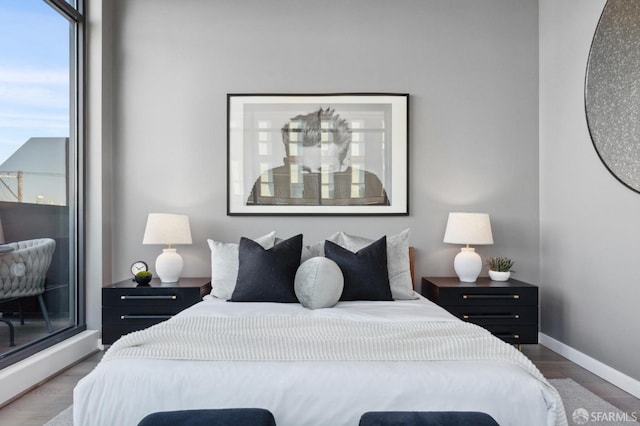 bedroom with wood-type flooring