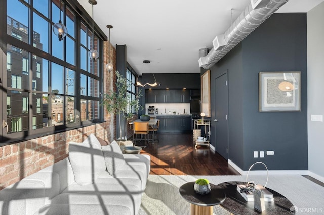 living room with dark hardwood / wood-style floors