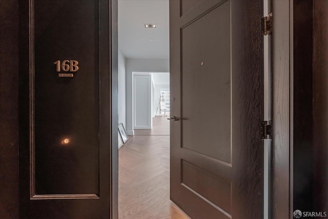 hall featuring light parquet flooring