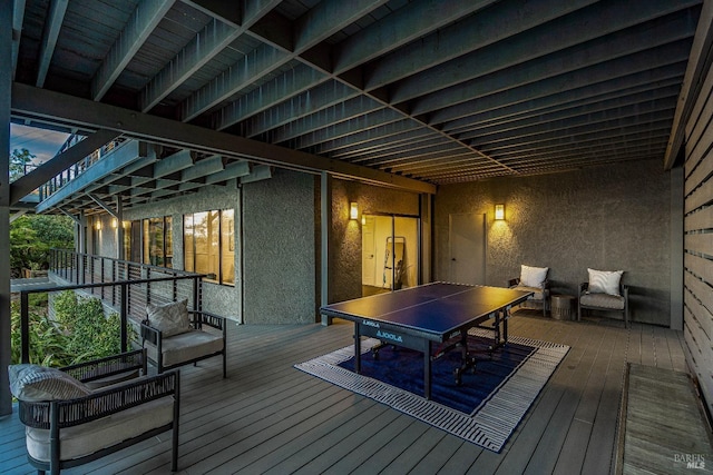 wooden deck with outdoor dining space