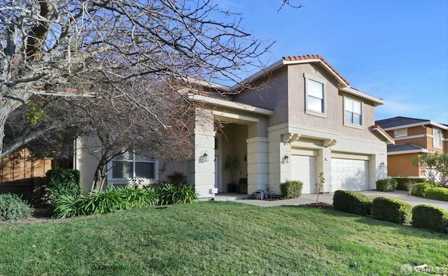 view of front of home with a garage and a front lawn