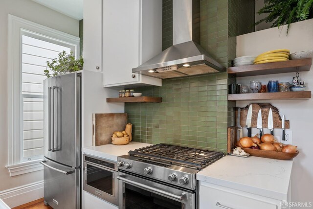 719-721 Shotwell St, San Francisco, CA 94110 - kitchen featuring wall chimney exhaust hood, high end appliances, open shelves, and white cabinetry