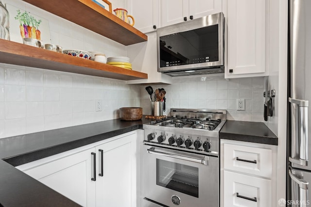 719-721 Shotwell St, San Francisco, CA 94110 - kitchen featuring open shelves, appliances with stainless steel finishes, dark countertops, and backsplash