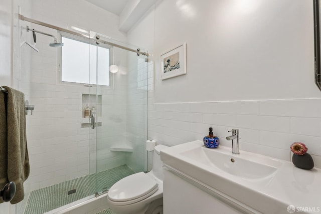 719-721 Shotwell St, San Francisco, CA 94110 - bathroom featuring a stall shower, toilet, tile walls, vanity, and a wainscoted wall
