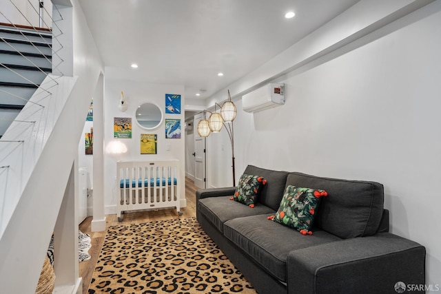 719-721 Shotwell St, San Francisco, CA 94110 - bedroom featuring a wall unit AC, wood finished floors, and recessed lighting
