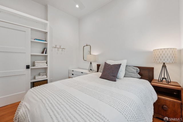 719-721 Shotwell St, San Francisco, CA 94110 - bedroom with wood finished floors and recessed lighting