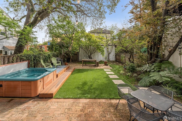 719-721 Shotwell St, San Francisco, CA 94110 - view of yard featuring a hot tub, a patio, and outdoor dining area