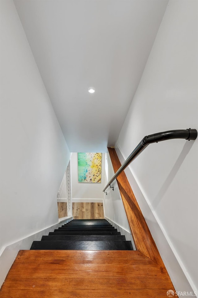 719-721 Shotwell St, San Francisco, CA 94110 - stairs featuring wood finished floors and recessed lighting