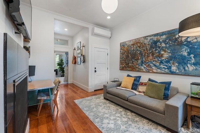 719-721 Shotwell St, San Francisco, CA 94110 - living area featuring an AC wall unit, wood-type flooring, recessed lighting, and baseboards