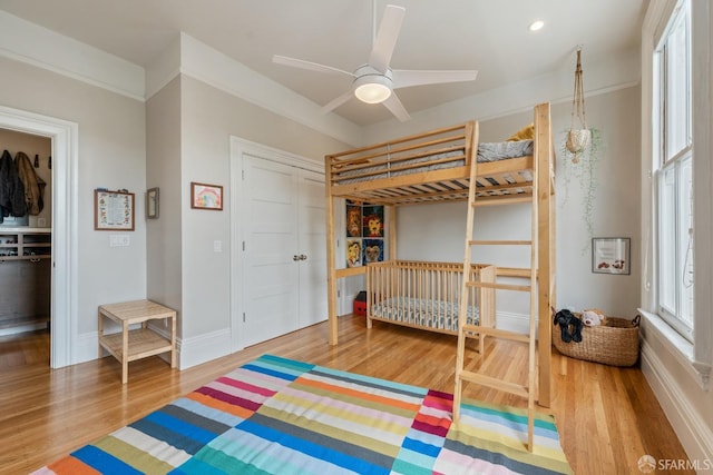 719-721 Shotwell St, San Francisco, CA 94110 - bedroom with wood finished floors, baseboards, recessed lighting, and a closet