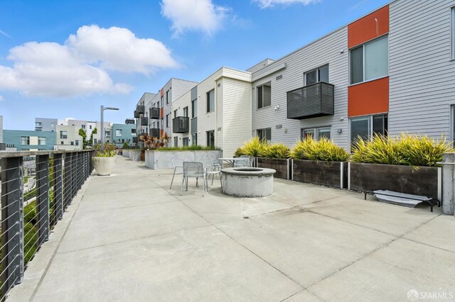 50 Jerrold Ave Unit 215, San Francisco, CA 94124 - surrounding community featuring a residential view, a fire pit, and a patio