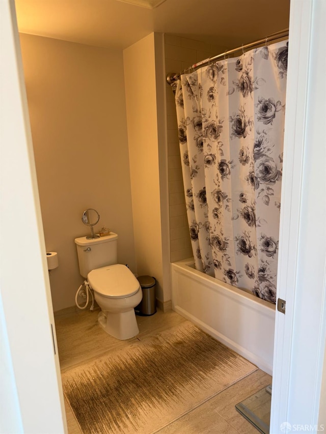 50 Jerrold Ave Unit 215, San Francisco, CA 94124 - full bath with toilet, shower / bath combo, and tile patterned flooring