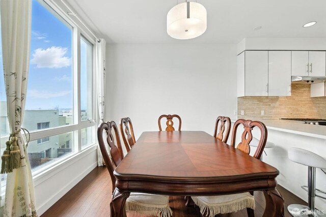50 Jerrold Ave Unit 215, San Francisco, CA 94124 - dining room with wood finished floors and recessed lighting