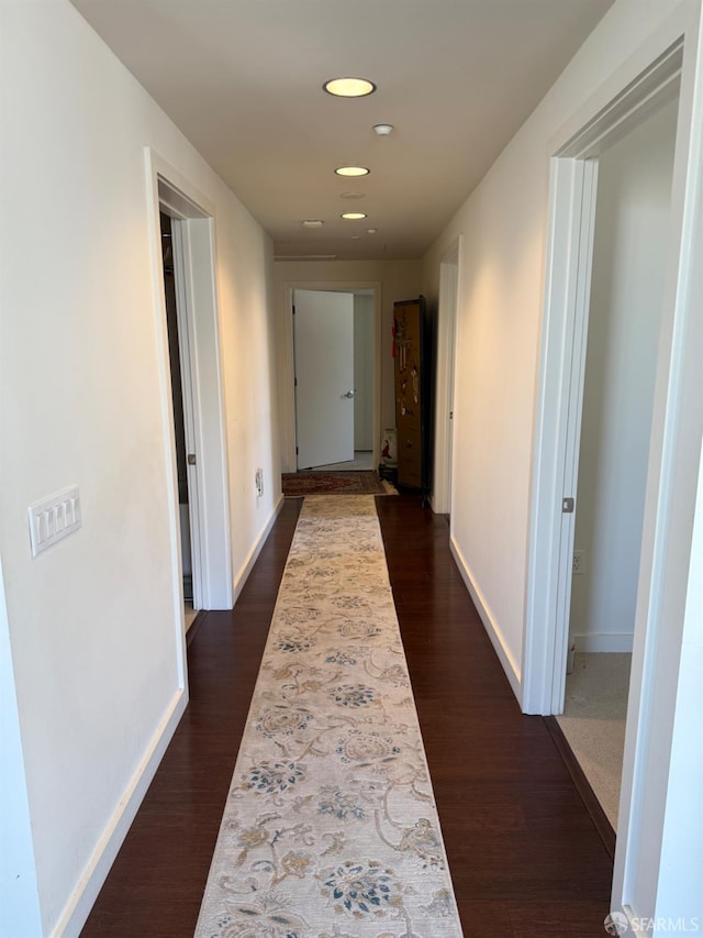 50 Jerrold Ave Unit 215, San Francisco, CA 94124 - hallway with dark wood-style flooring, baseboards, and recessed lighting
