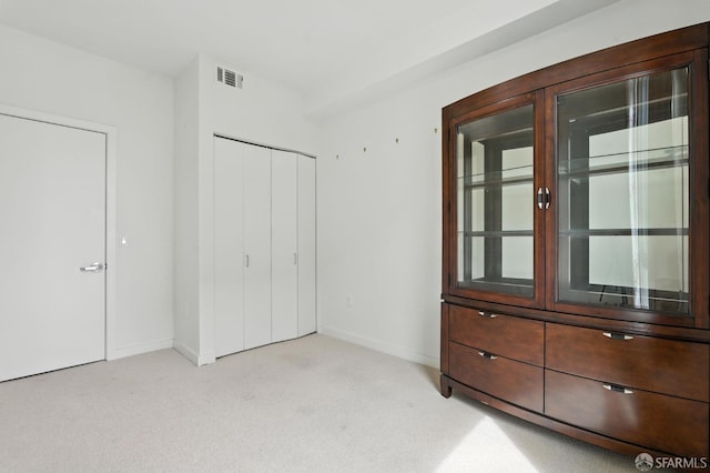 50 Jerrold Ave Unit 215, San Francisco, CA 94124 - unfurnished bedroom featuring light carpet and a closet