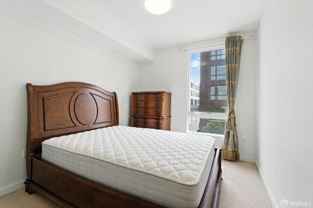 50 Jerrold Ave Unit 215, San Francisco, CA 94124 - bedroom with light colored carpet and baseboards
