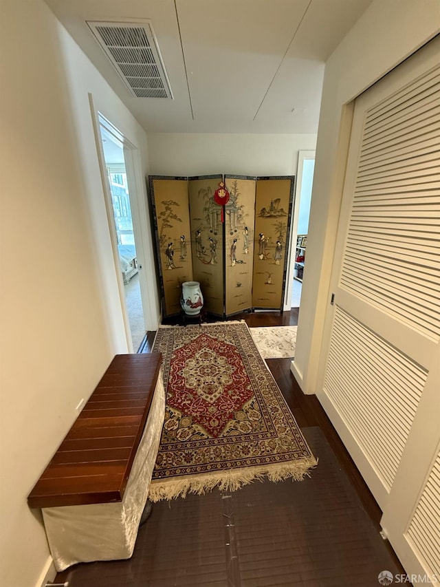 50 Jerrold Ave Unit 215, San Francisco, CA 94124 - hall featuring attic access, wood finished floors, and baseboards