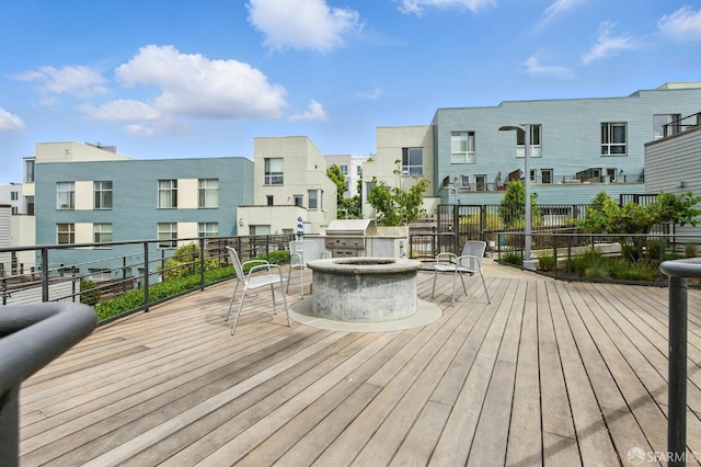 50 Jerrold Ave Unit 215, San Francisco, CA 94124 - wooden terrace with a residential view and a grill