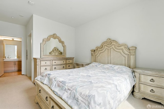 50 Jerrold Ave Unit 215, San Francisco, CA 94124 - bedroom with light carpet and ensuite bathroom