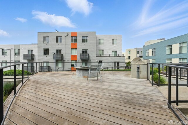 50 Jerrold Ave Unit 215, San Francisco, CA 94124 - deck featuring an outdoor fire pit and a residential view