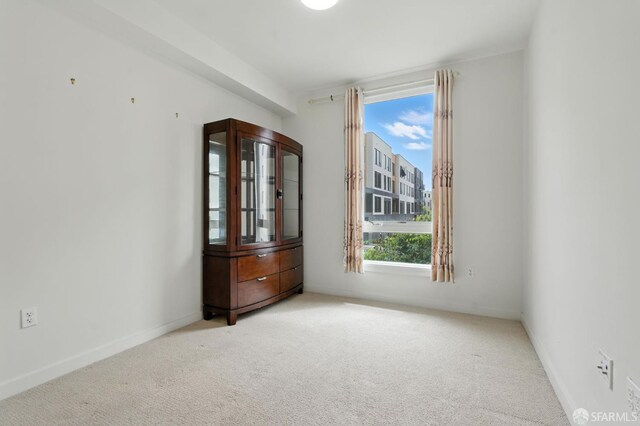 50 Jerrold Ave Unit 215, San Francisco, CA 94124 - empty room with healthy amount of natural light and carpet floors
