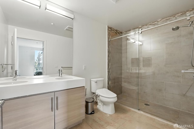 50 Jerrold Ave Unit 215, San Francisco, CA 94124 - full bathroom with double vanity, a stall shower, and tile patterned flooring