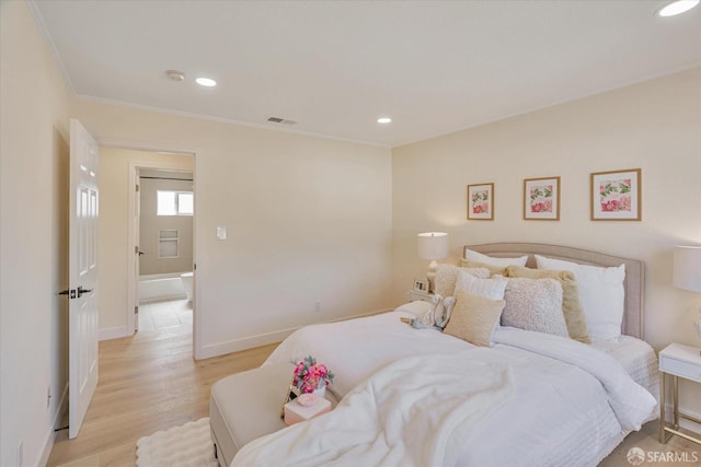 bedroom featuring recessed lighting, visible vents, baseboards, light wood-type flooring, and crown molding