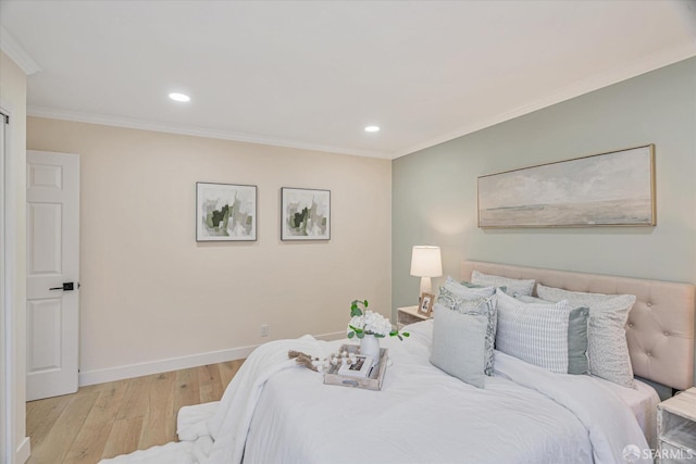 bedroom featuring ornamental molding, recessed lighting, baseboards, and wood finished floors