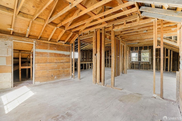 misc room featuring lofted ceiling