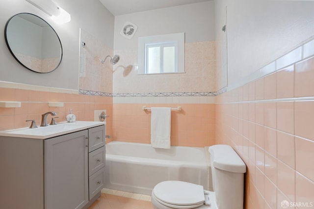 full bathroom with visible vents, toilet, tile patterned flooring, shower / washtub combination, and tile walls