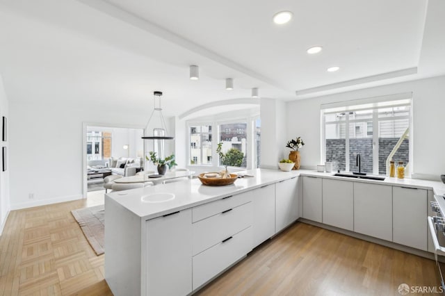 2100 Green St Unit 302, San Francisco, CA 94123 - kitchen featuring a wealth of natural light, modern cabinets, recessed lighting, and a sink