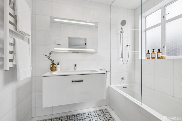 2100 Green St Unit 302, San Francisco, CA 94123 - bathroom featuring tile walls, bathtub / shower combination, and vanity