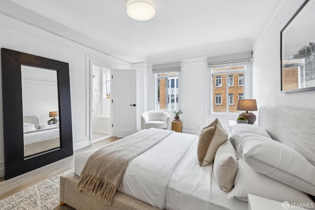 2100 Green St Unit 302, San Francisco, CA 94123 - bedroom featuring wood finished floors and ensuite bathroom