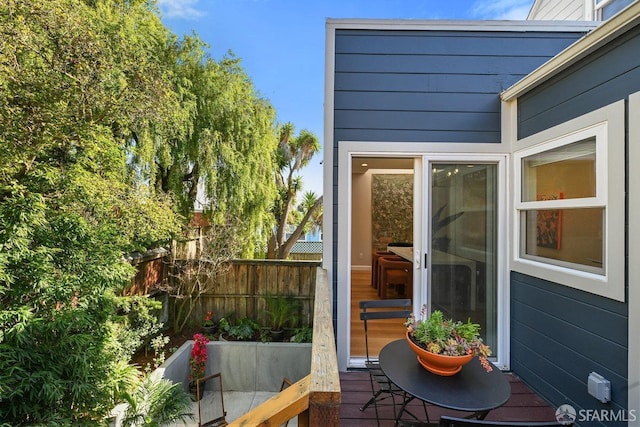 view of patio featuring fence