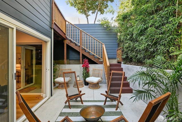 view of patio with stairway