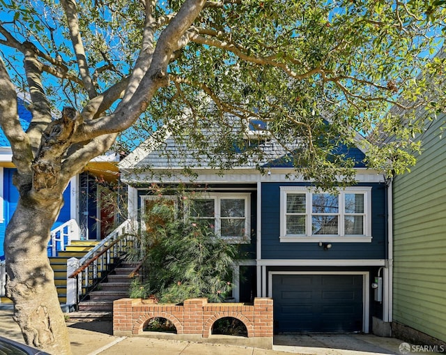 view of front of house featuring a garage and driveway