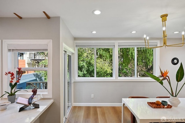 interior space with recessed lighting, light wood-type flooring, and baseboards