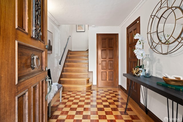 entrance foyer with ornamental molding