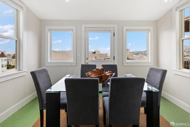 view of carpeted dining space