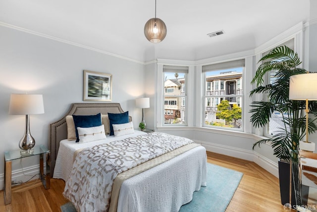 bedroom featuring light hardwood / wood-style floors