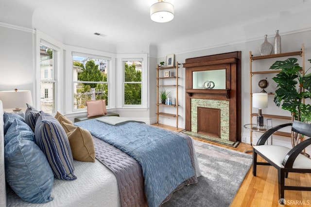 bedroom with light hardwood / wood-style flooring