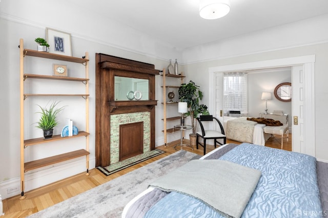 bedroom with hardwood / wood-style floors